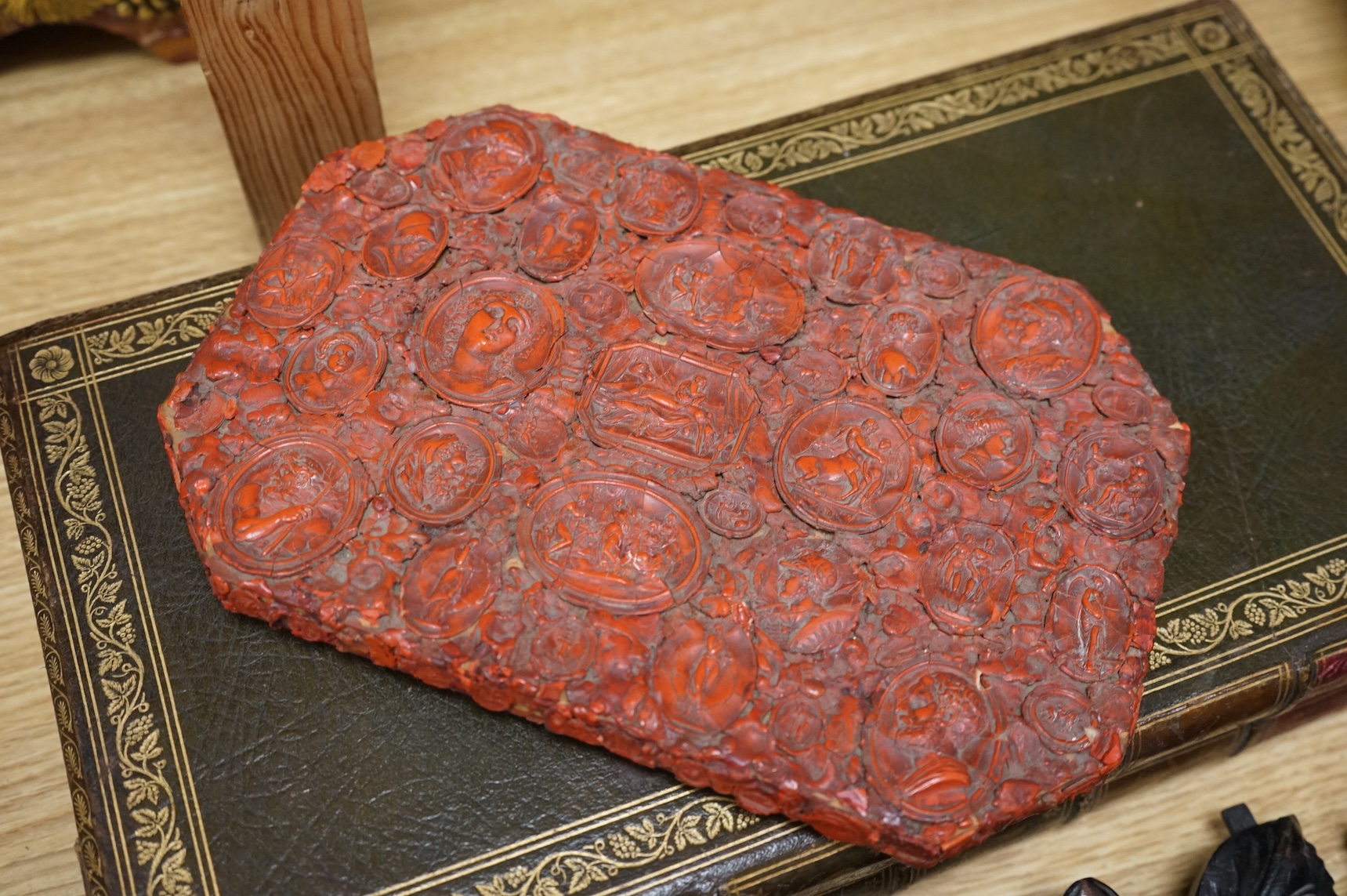 A backgammon games box, Sorrento box, a red wax seal mounted lid and a carved oak floral appliqué, 65cm wide (4)